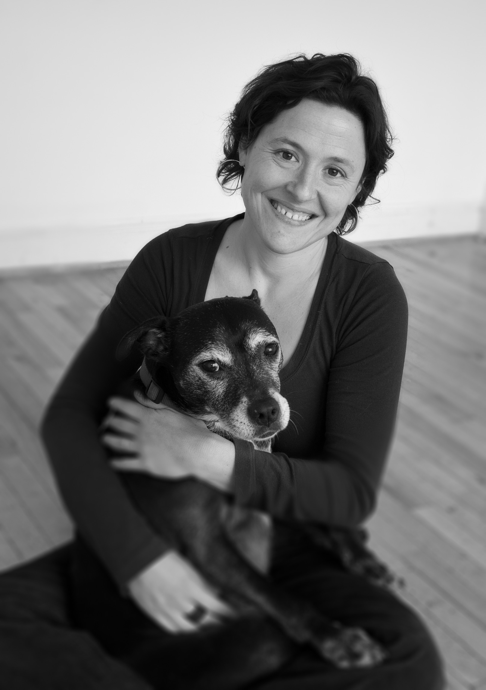 Gretchen Primack holding a dog
